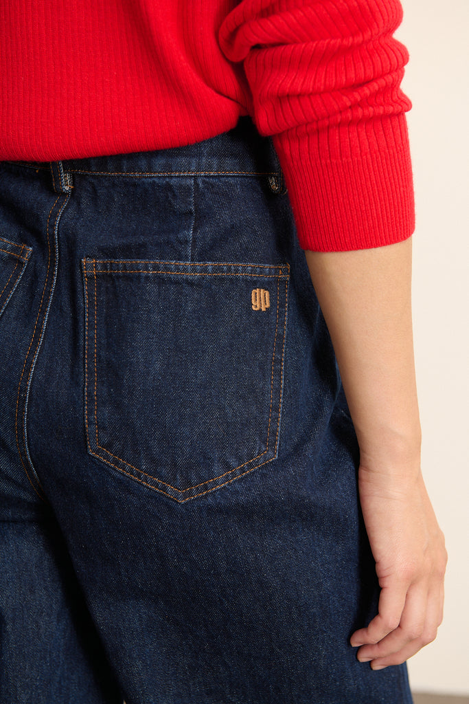 Bas pour femme à la coupe droite avec fermeture par un zip et un bouton, coloris brut 100 % coton. 